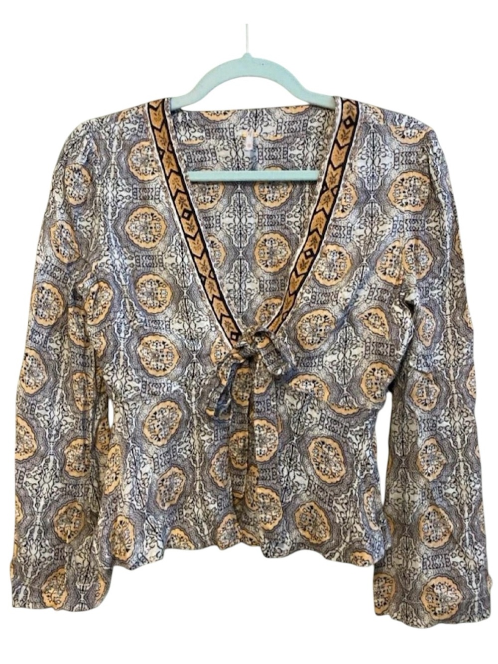 Free People 70s inspired bold print flare long sleeve Vneck top Boho Festival XS